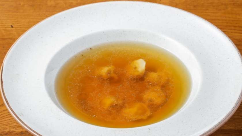 Beef broth with tortellini