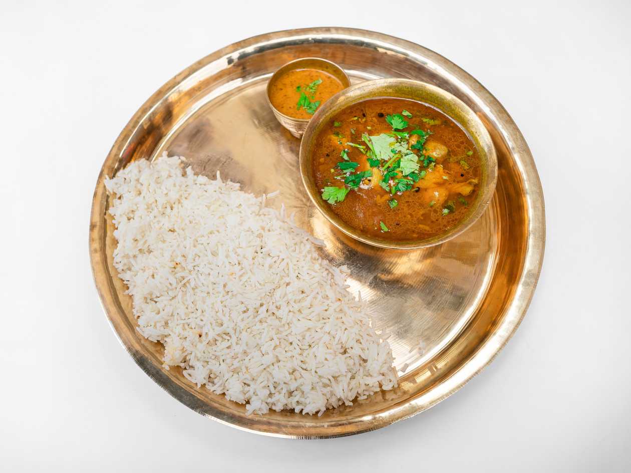 Special Rice (Ghee) with Bamboo cooked with Himalayan herbs + special tomato aachar
