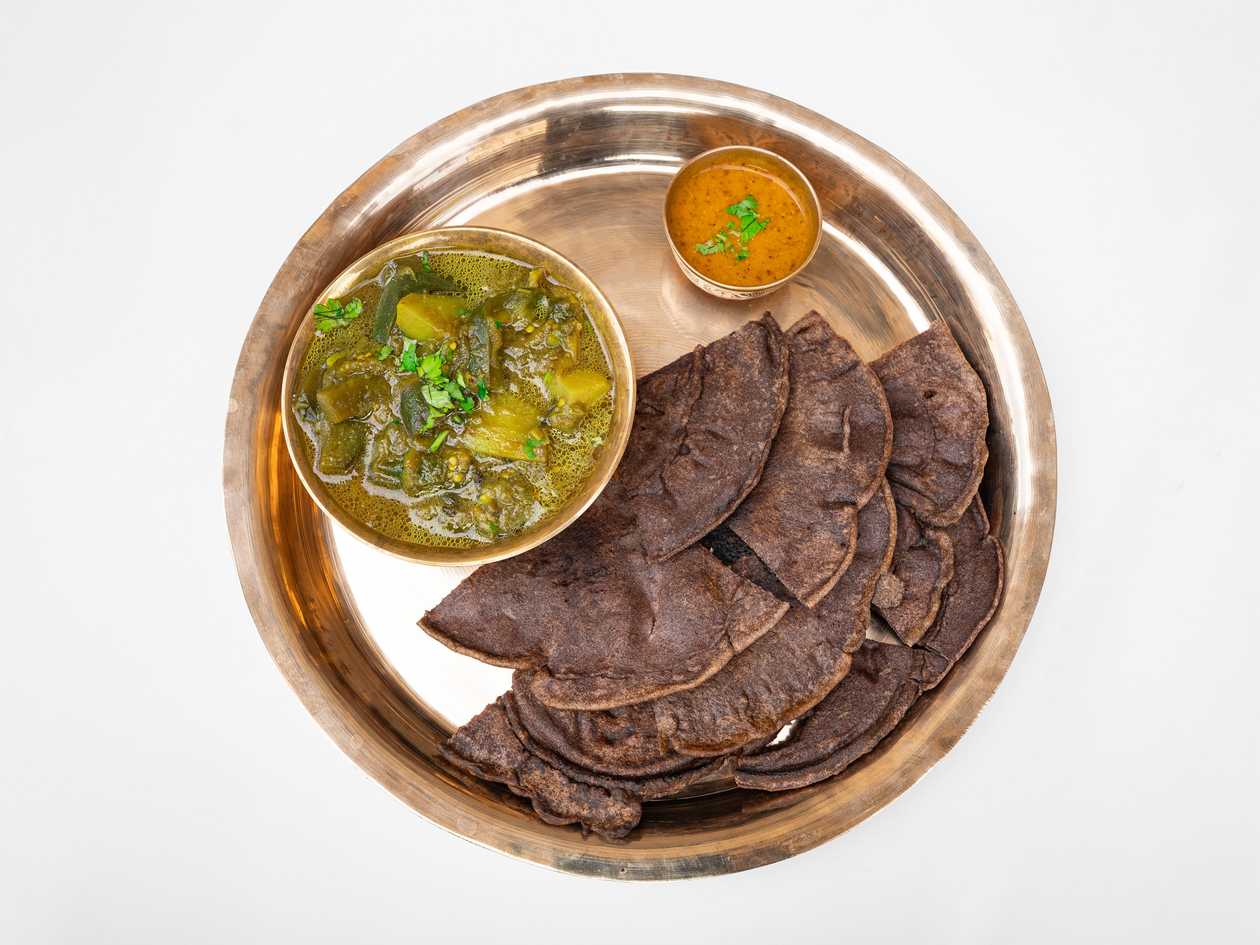 Herbs Roti (Ghee) with Bamboo cooked with Himalayan herbs + special tomato aachar