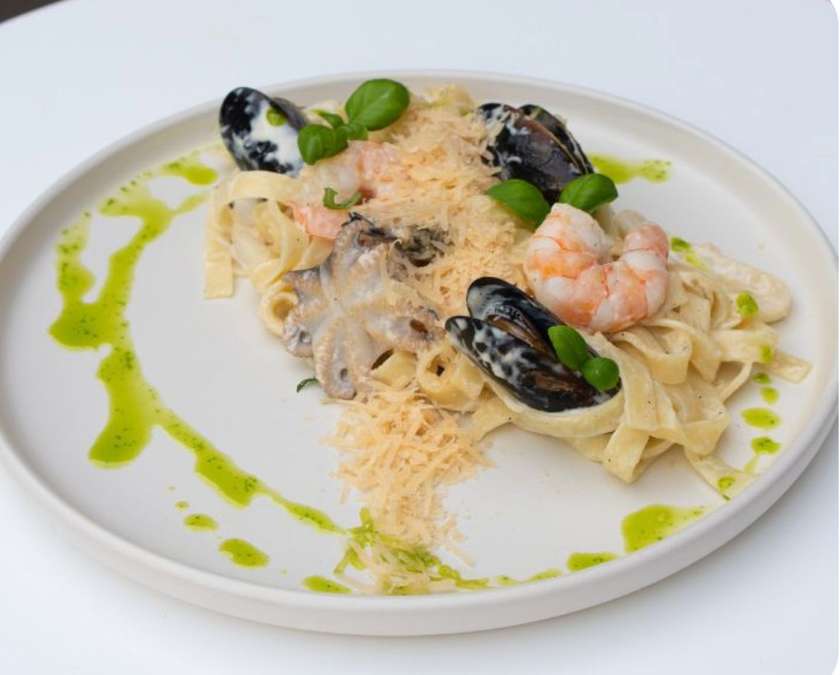 Pappardelle with seafood in cream sauce