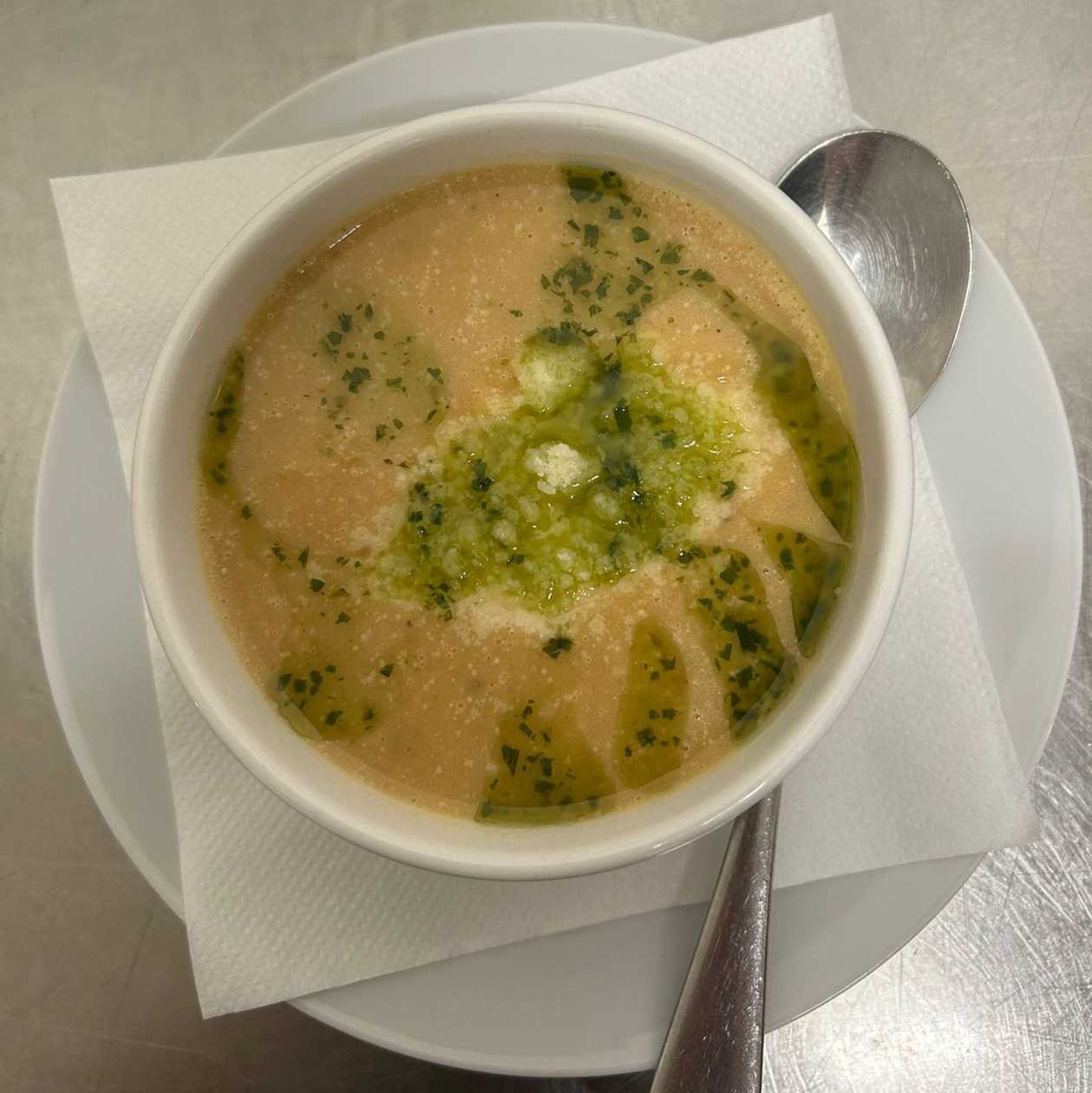 Potato cream with sun-dried tomatoes, basil pesto and parmesan