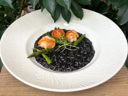 Risotto nero with shrimp and asparagus