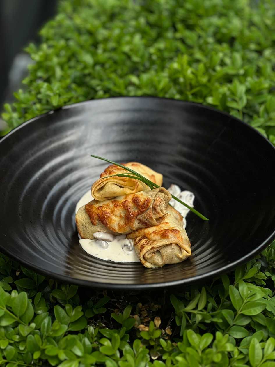 Crepes with meat and mushrooms