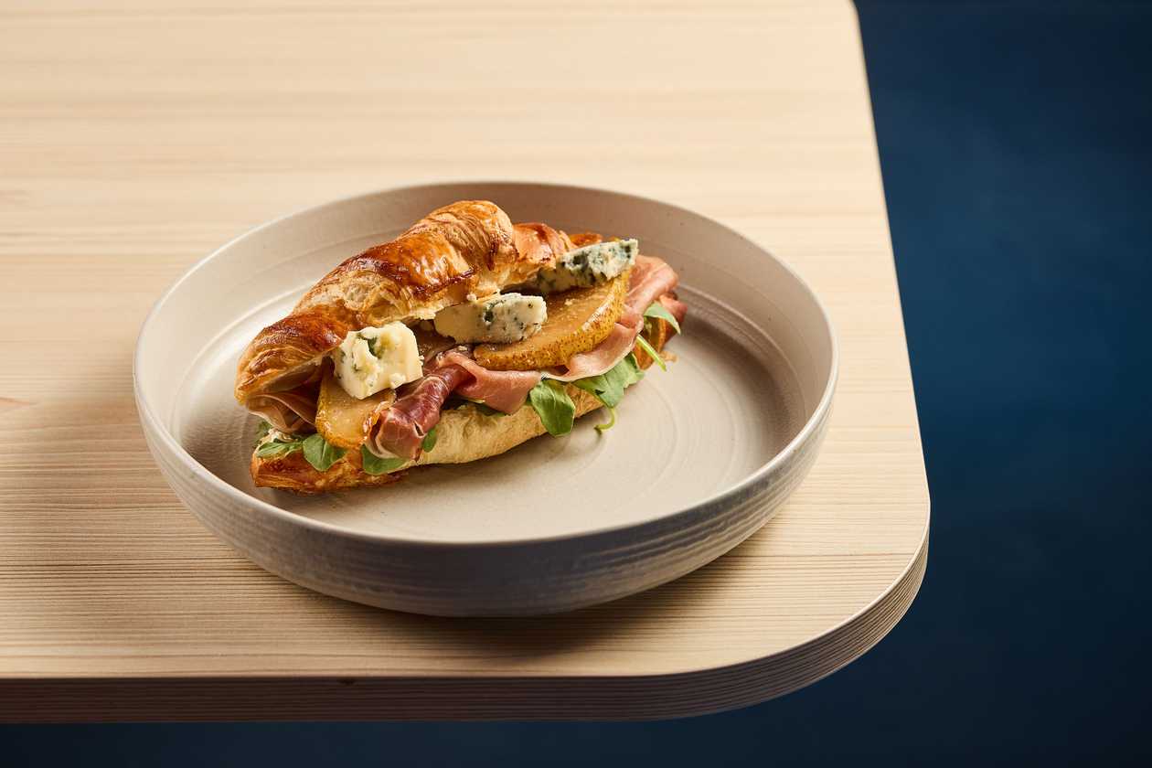 Croissant with caramelized pear and gorgonzola