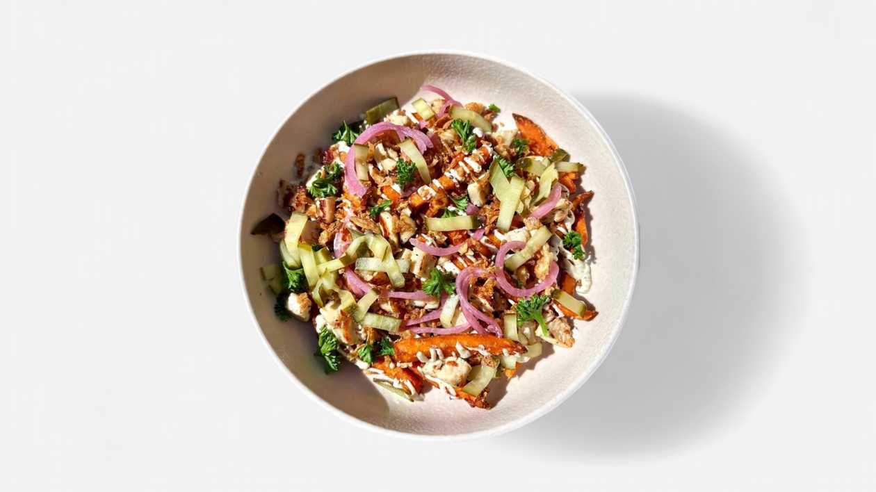 Loaded sweet potato fries with chicken and marinated onion