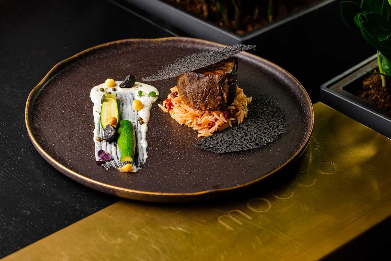 Veal Steak with Rice and Spicy Sauce