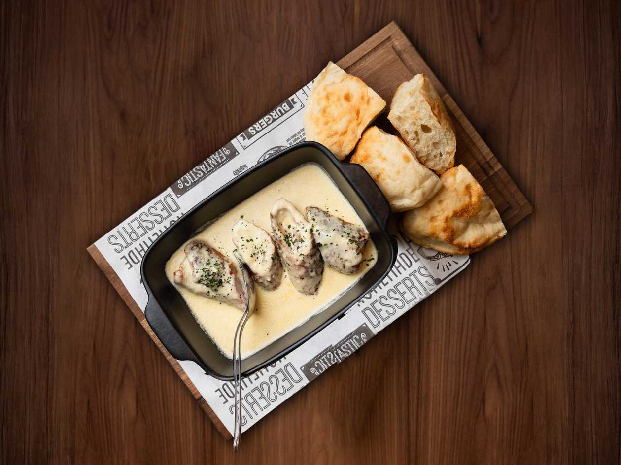 Stuffed pork tenderloin in kaymak sauce