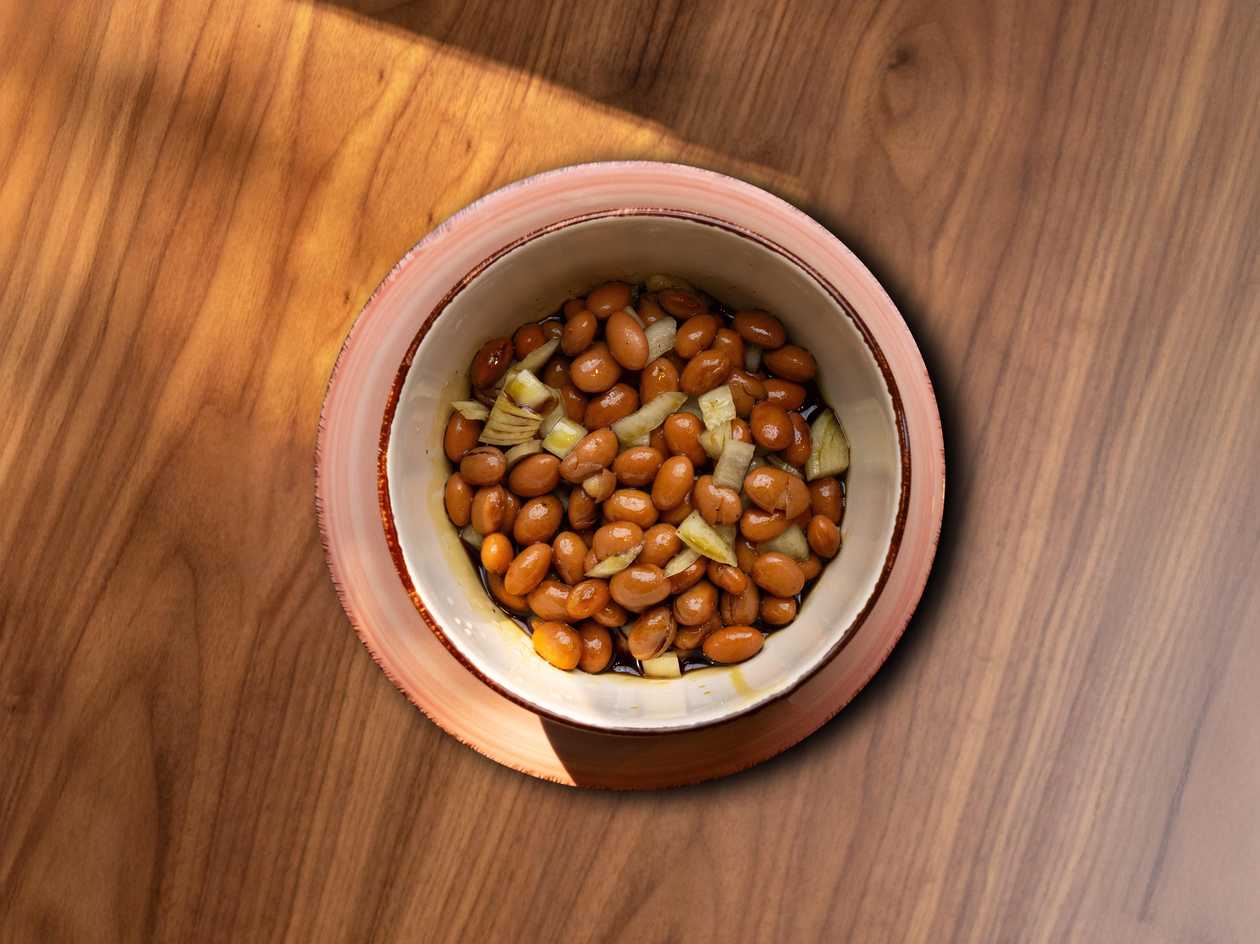Beans with pumpkin oil