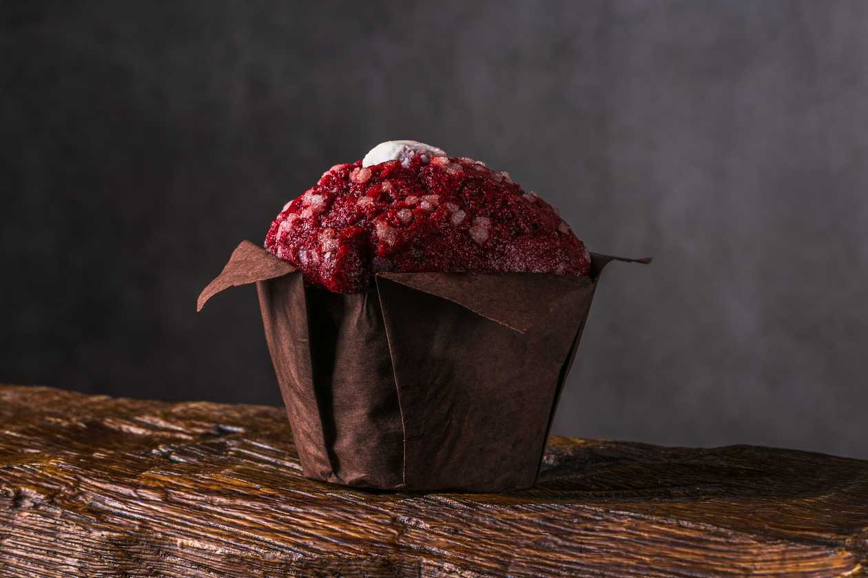 Red velvet muffin with white chocolate filling