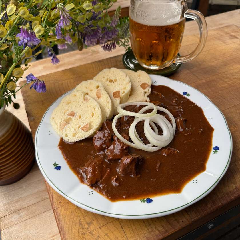 Beef goulash, onion, bread dumpling