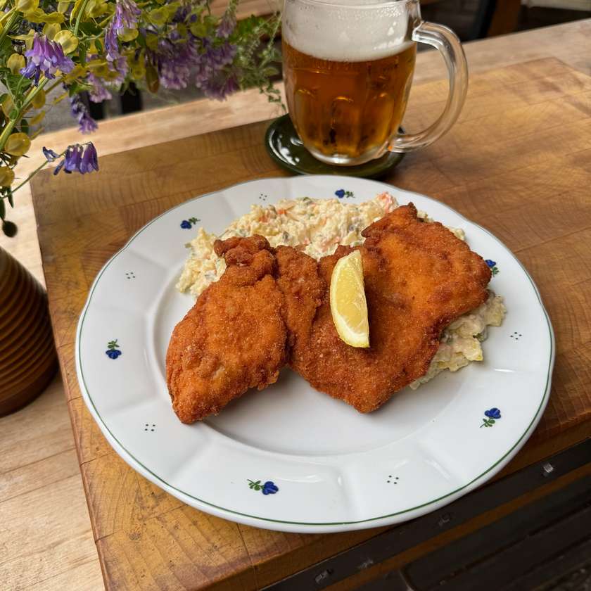 Fried chicken schnitzel, potato salad