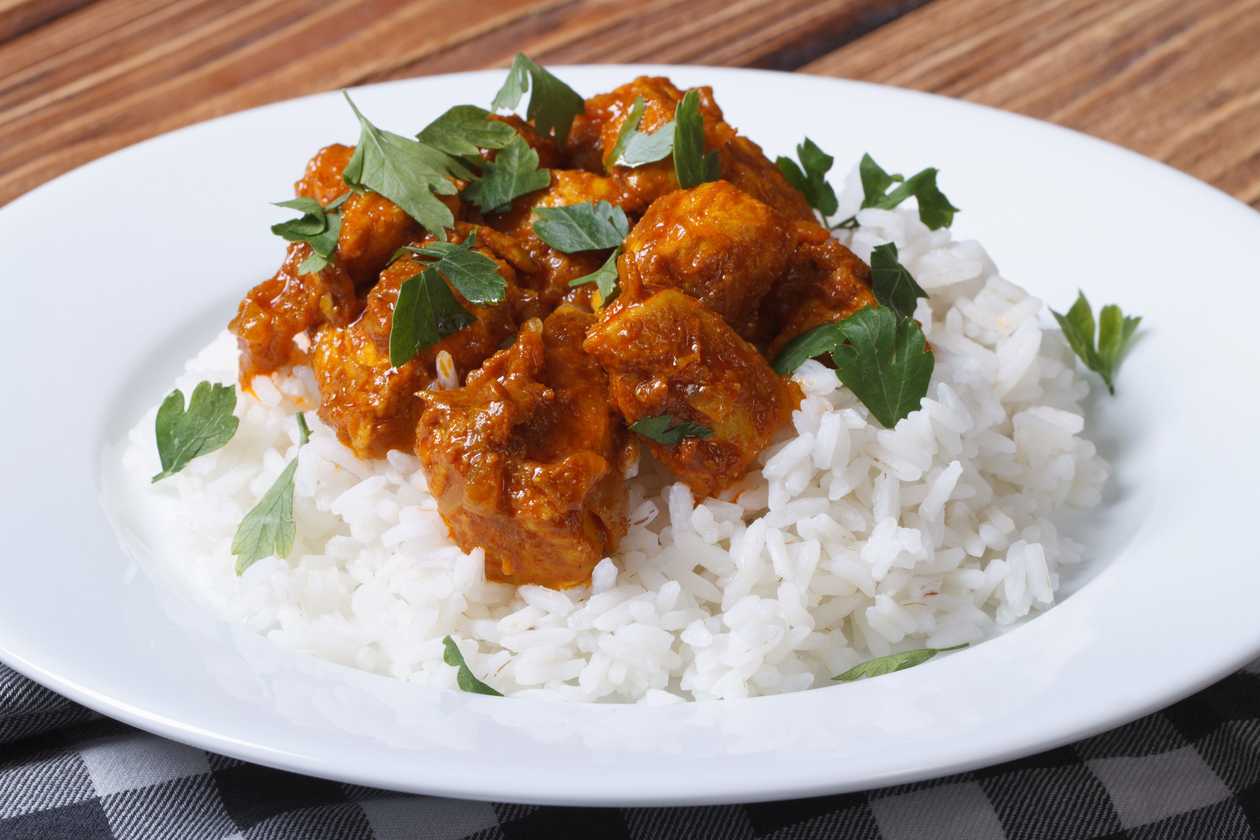 Chicken meat on curry, rice