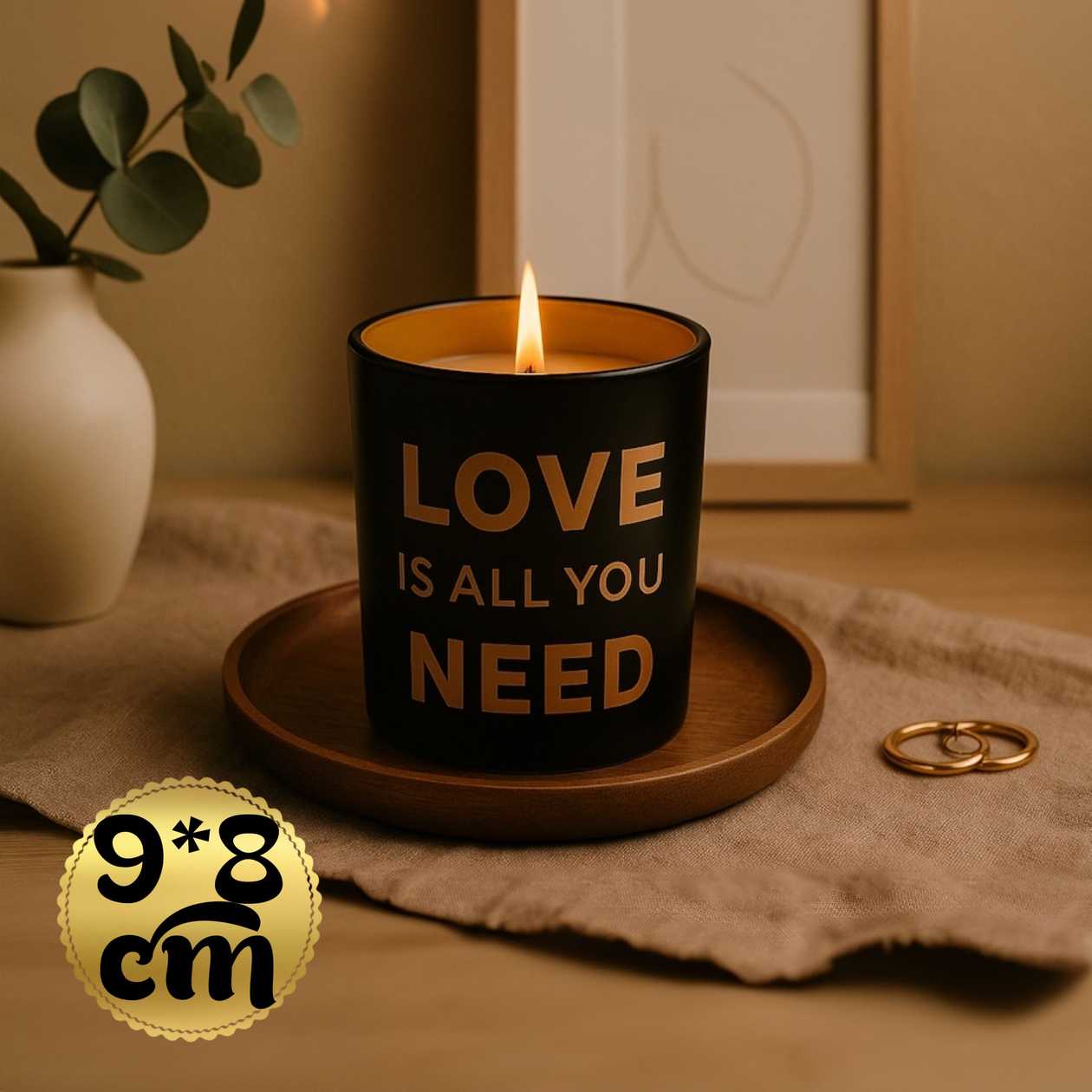 Decorative scented candle black and gold "Love is All You Need"