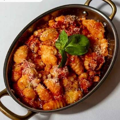 Gnocchi in Tomato Sauce with Bacon