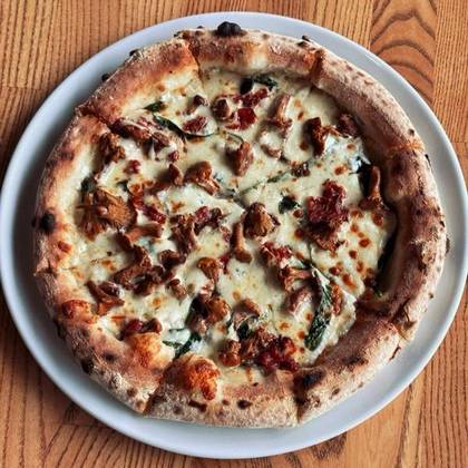 Pizza with Chanterelles and Sun-Dried Tomatoes