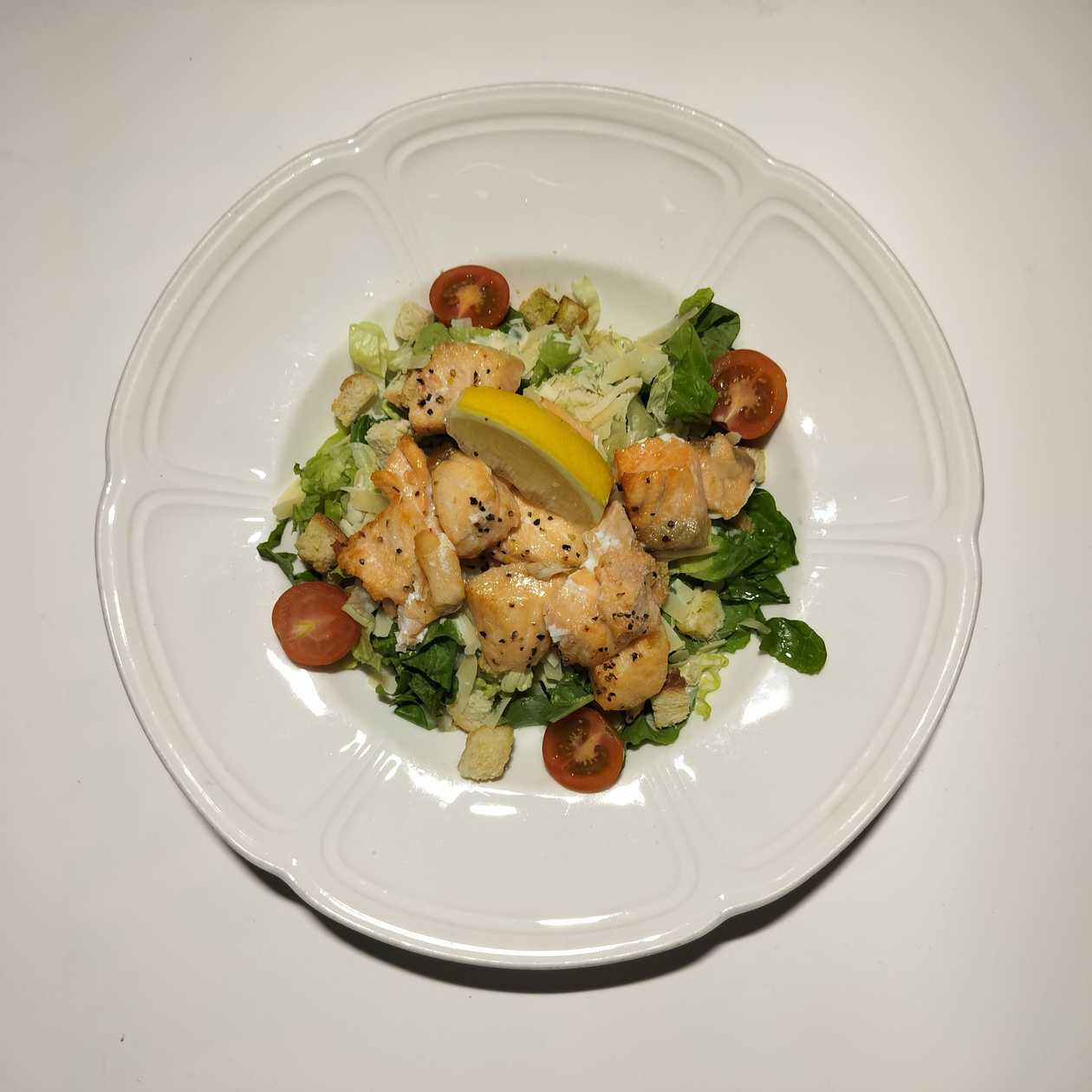 Caesar salad with grilled salmon