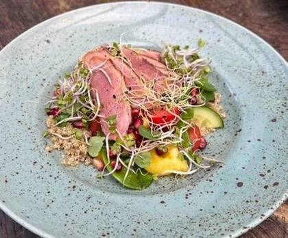 Quinoa salad with smoked duck breast