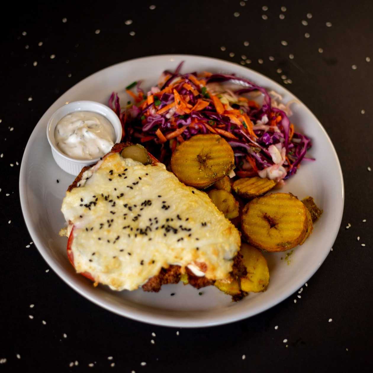 Chicken chop Hedgehog's style with boiled-fried potatoes, pickled onions, coleslaw and beet salad