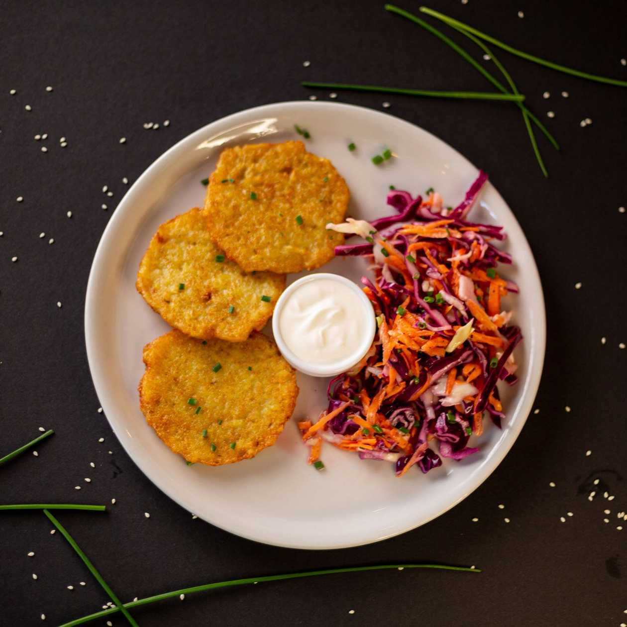 Potato pancakes with sour cream