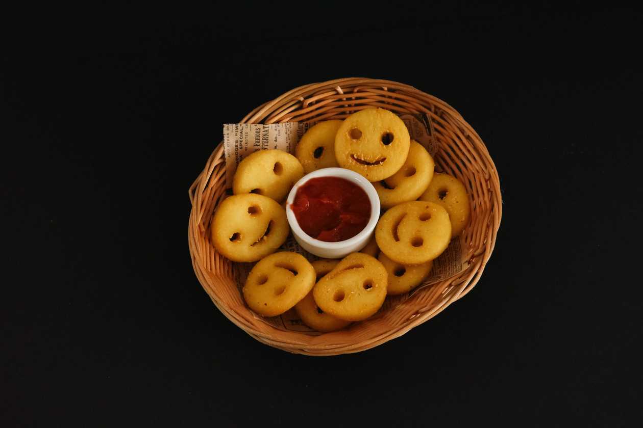 Potato smileys with ketchup