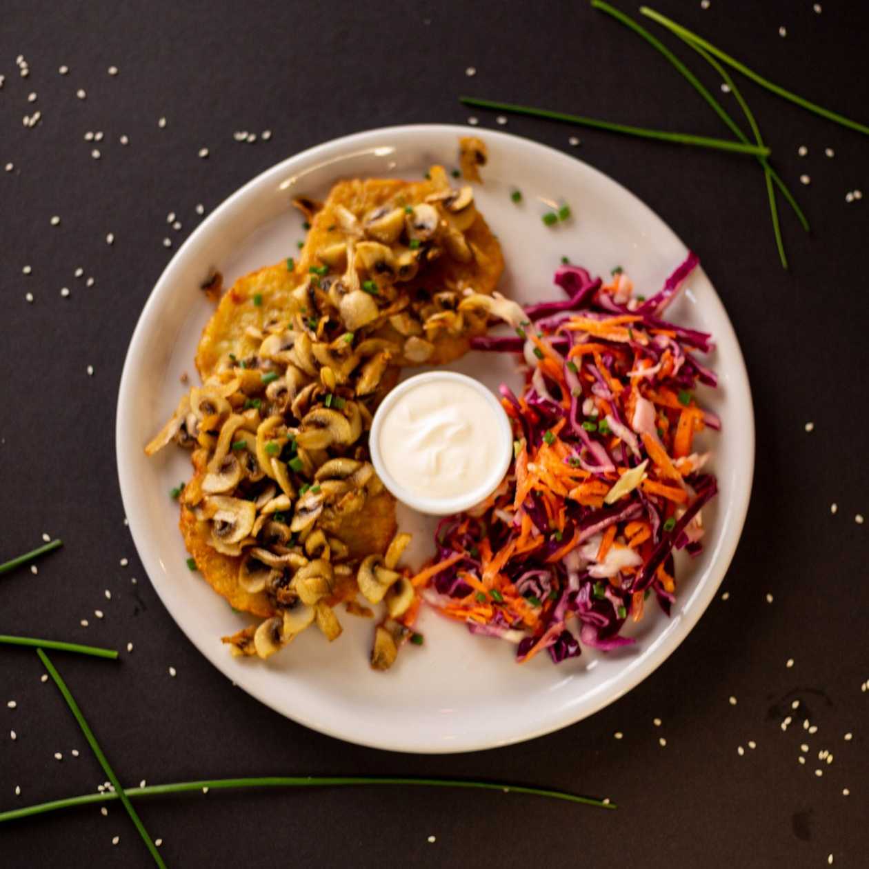 Potato pancakes with fried mushrooms and vegan mayonnaise