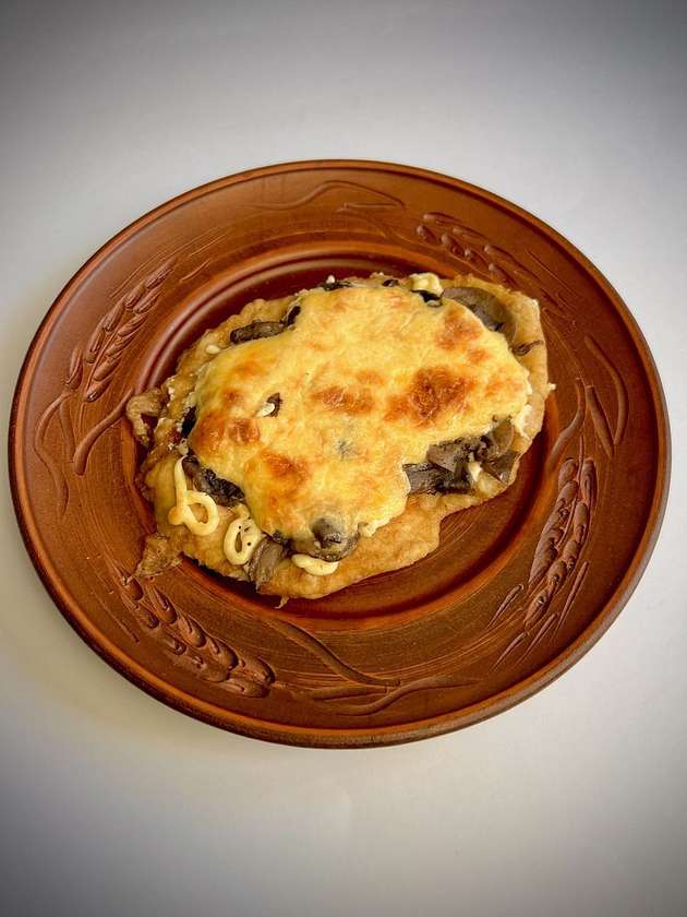 Куряче філе запечене з грибами