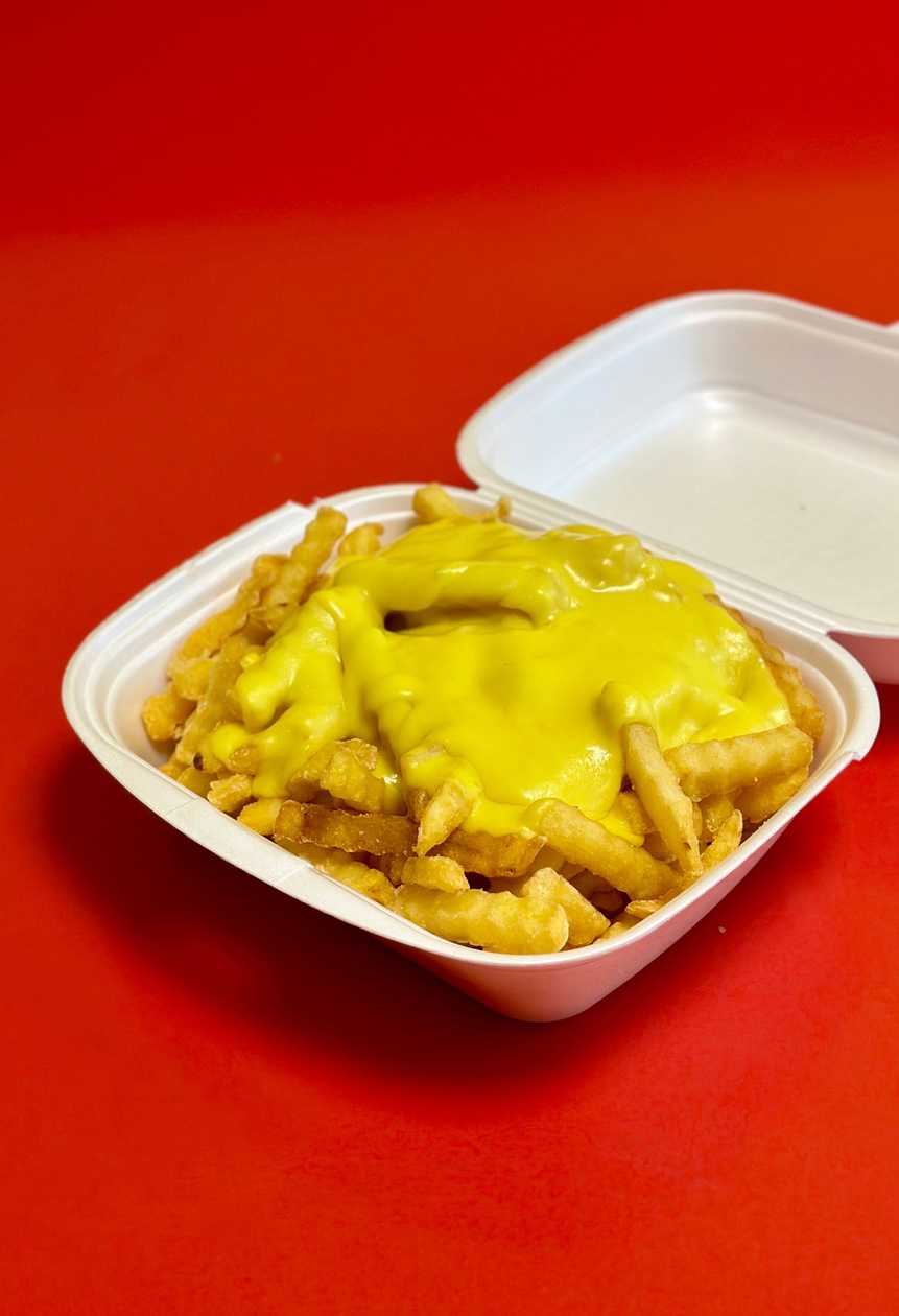 Gruzdintos bulvytės su čederio sūrio padažu