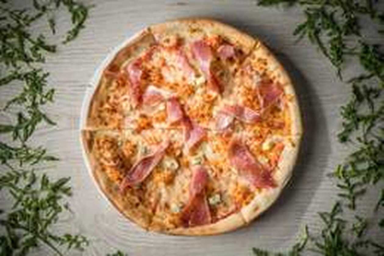 Family Crudo and Gorgonzola Pizza