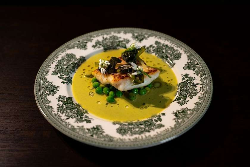 Cod with green peas and asparagus