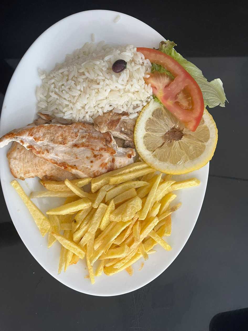 Grilled Chicken Steak with Rice and Fried Potatoes