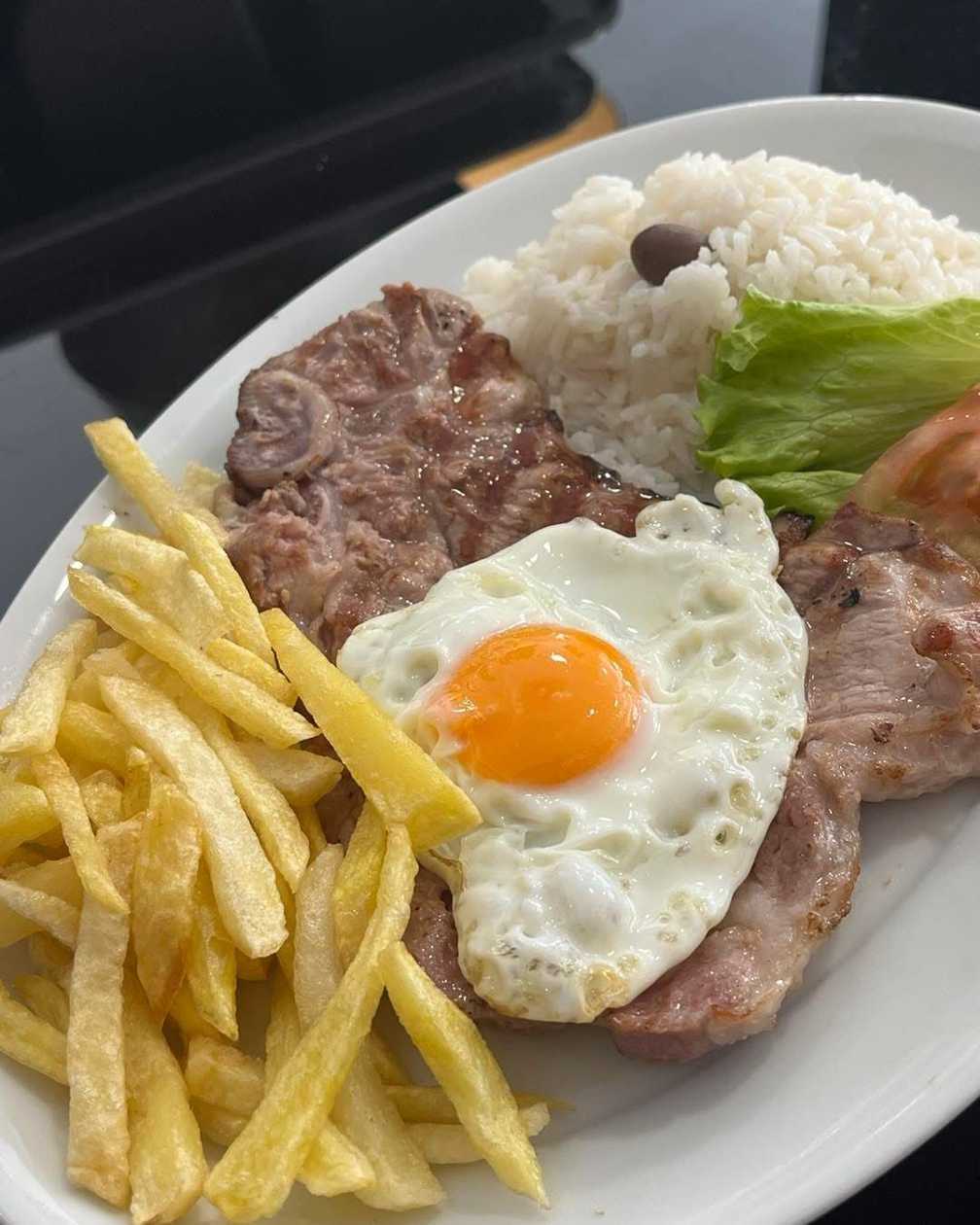 Pork Chops with Rice, Fried Potato and Egg