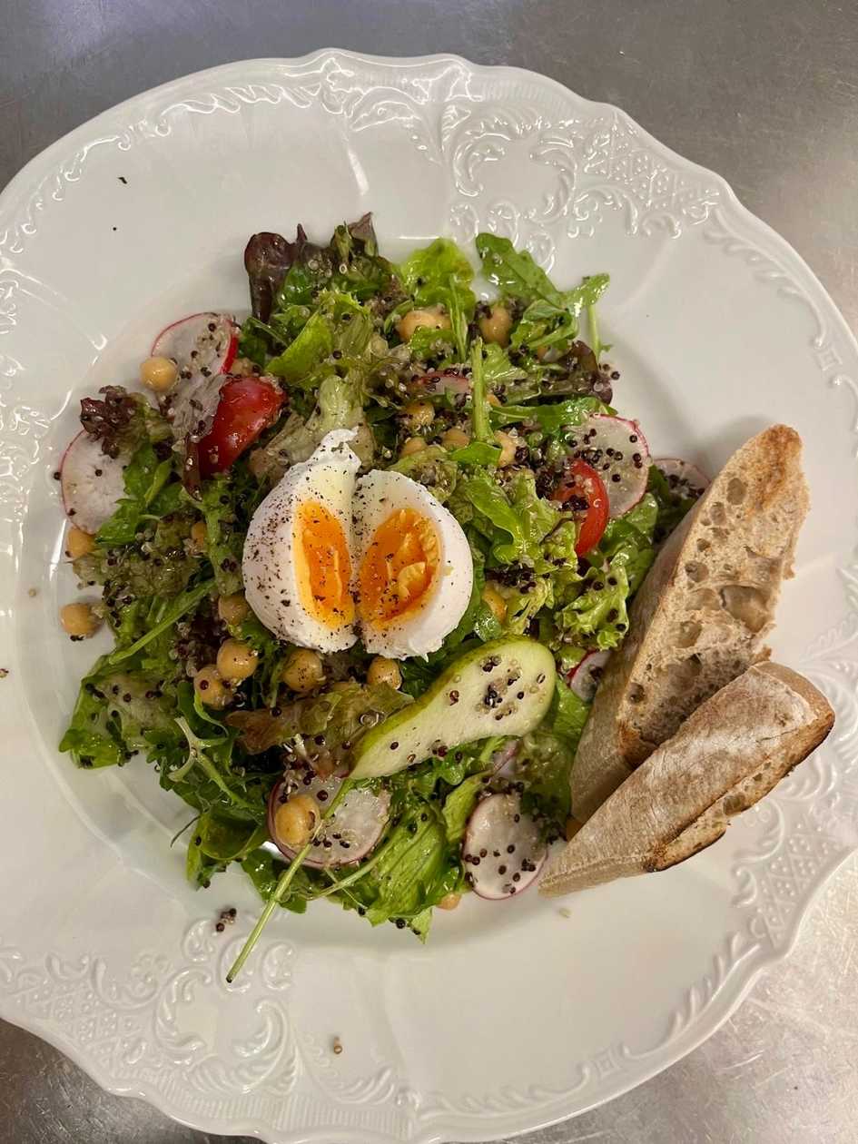 Chickpea salad, quinoa, poached eggs, radishes, pear, cherry tomatoes, arugula