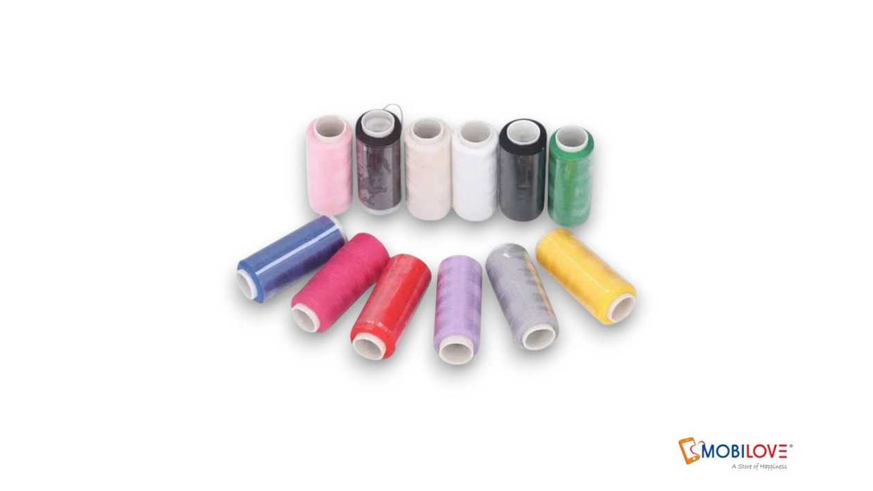 Black and white and colored threads for sewing, 12 pieces.