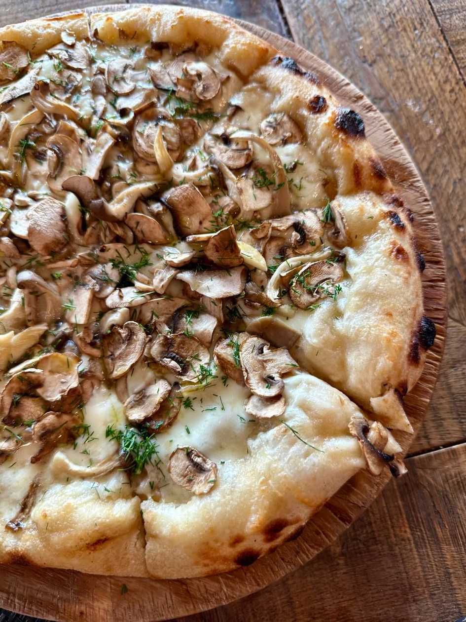 Pizza with seasonal mushrooms