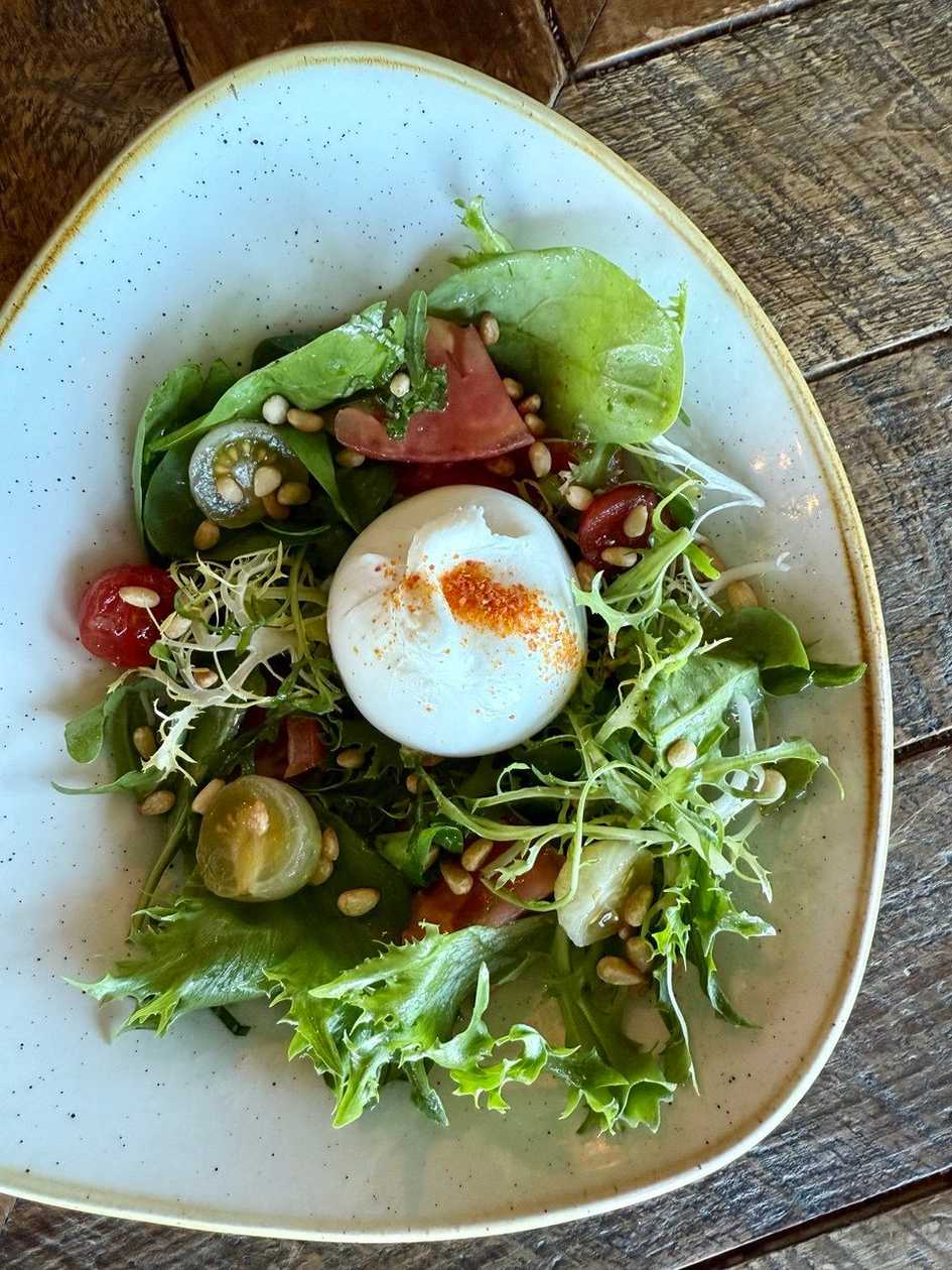 Burrata with tomatoes and herb pesto