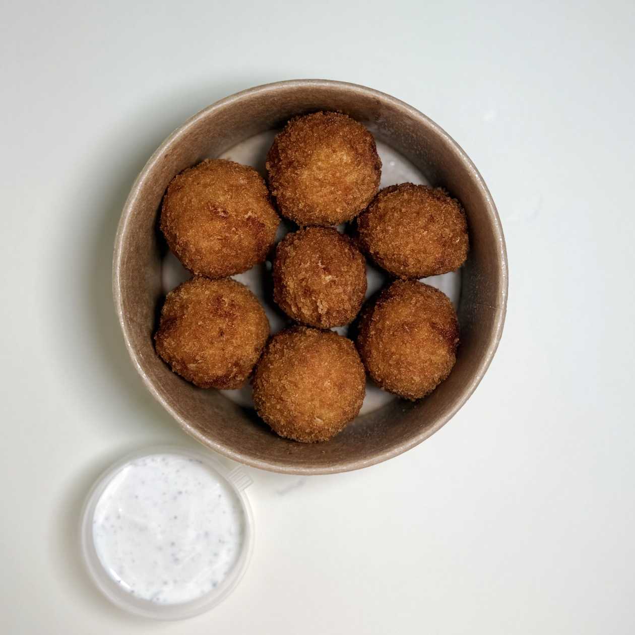 Chicken balls with sour cream and garlic sauce