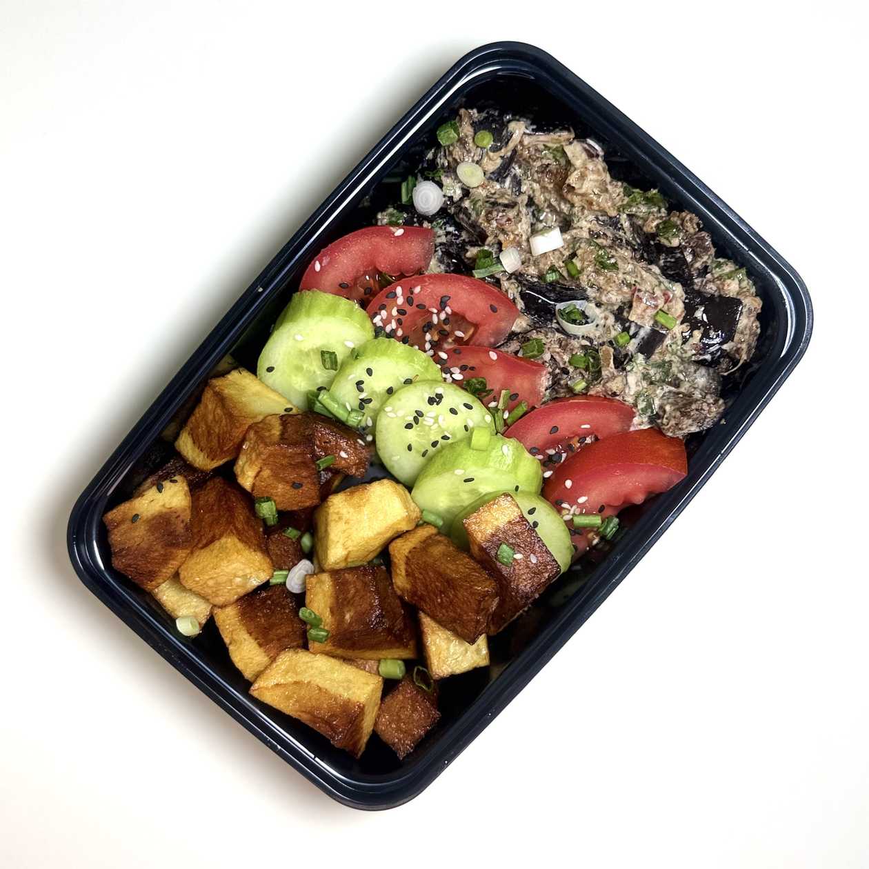 Fried Potatoes with eggplant, garlic and mayo salad with tomatoes