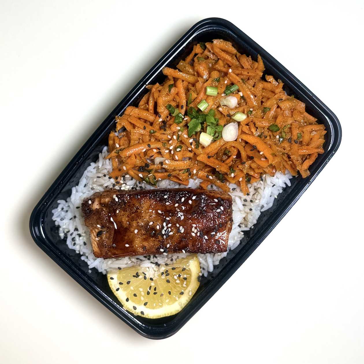 Norwegian trout with carrot salad and rice garnish
