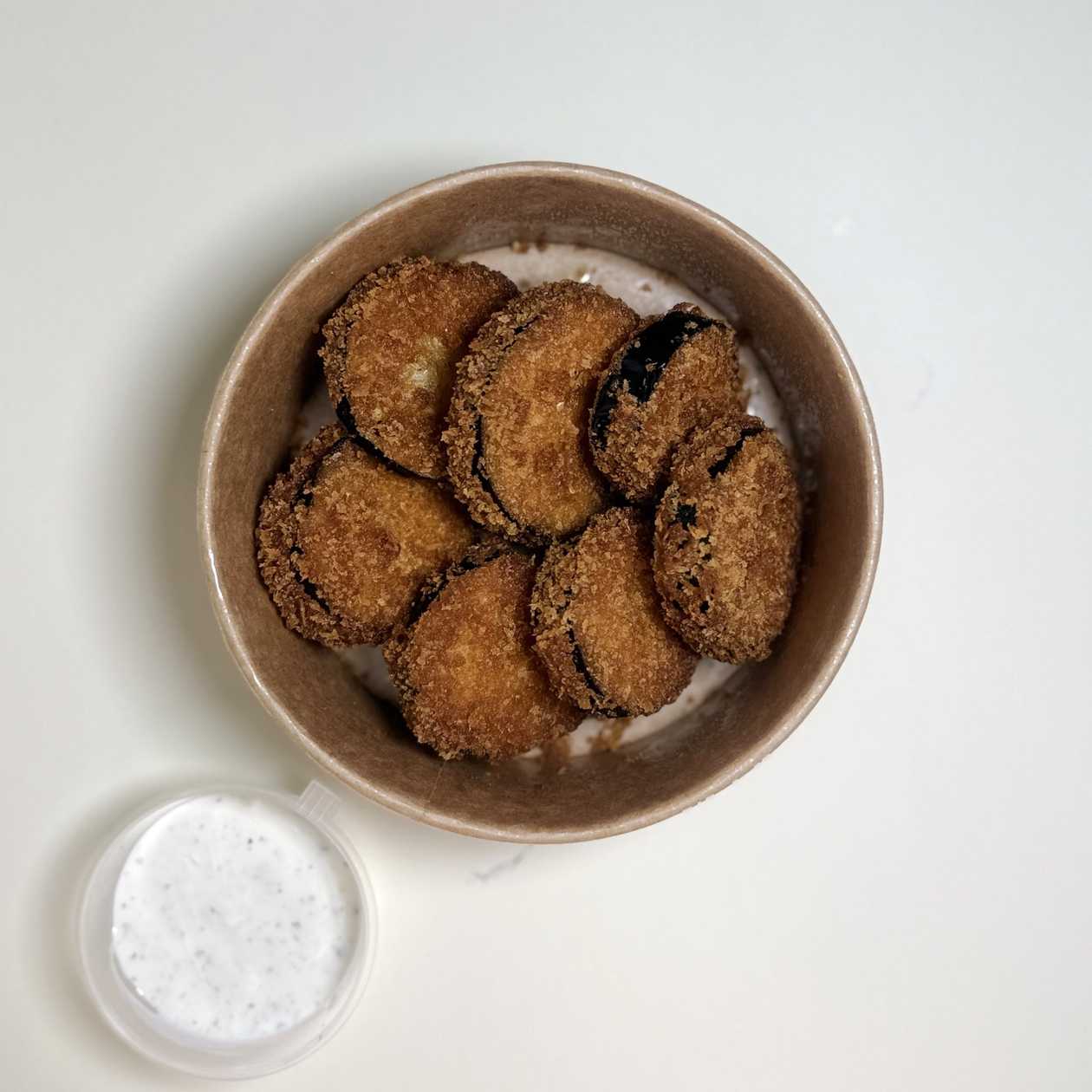 Eggplant medallions with garlic sauce