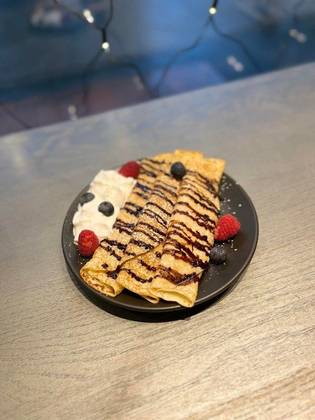 Pancakes with Curd, Berries and Chocolate Sauce