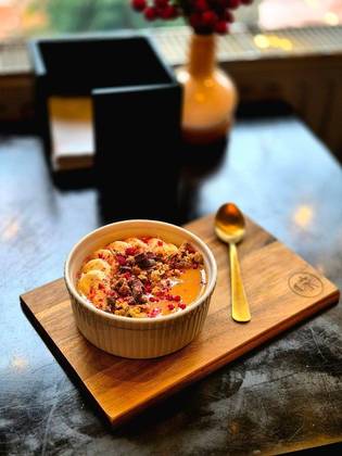 Greek Yogurt with Granola, Banana, Freeze-Dried Raspberries and Almond Cream