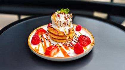 American Pancakes with Whipped Cream and Berries