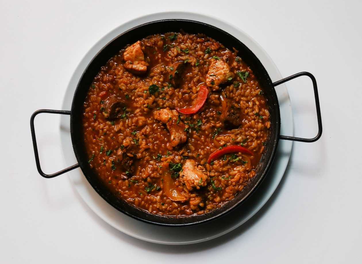 Paella with chorizo, chicken and vegetables