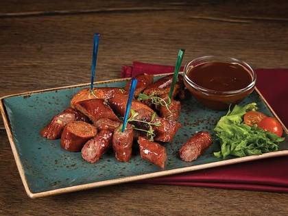 Sausage assorti from Spain with BBQ sauce