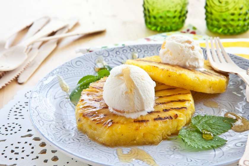 Fried pineapple with an ice cream scoop