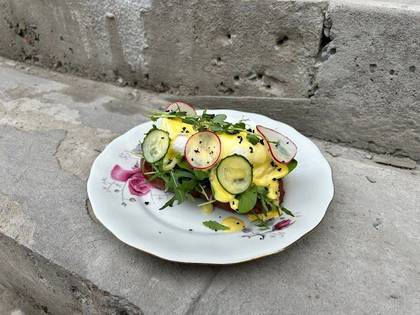 Benedict with poached eggs and hollandaise sauce