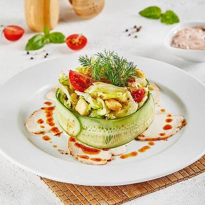 Chicken salad with baby potatoes in piquant sauce