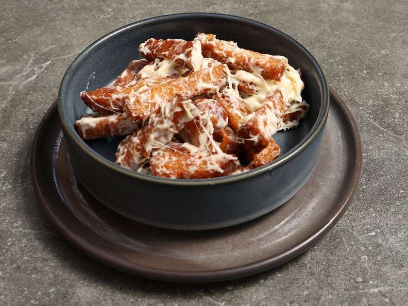 Baked bread with mayonnaise and cheese