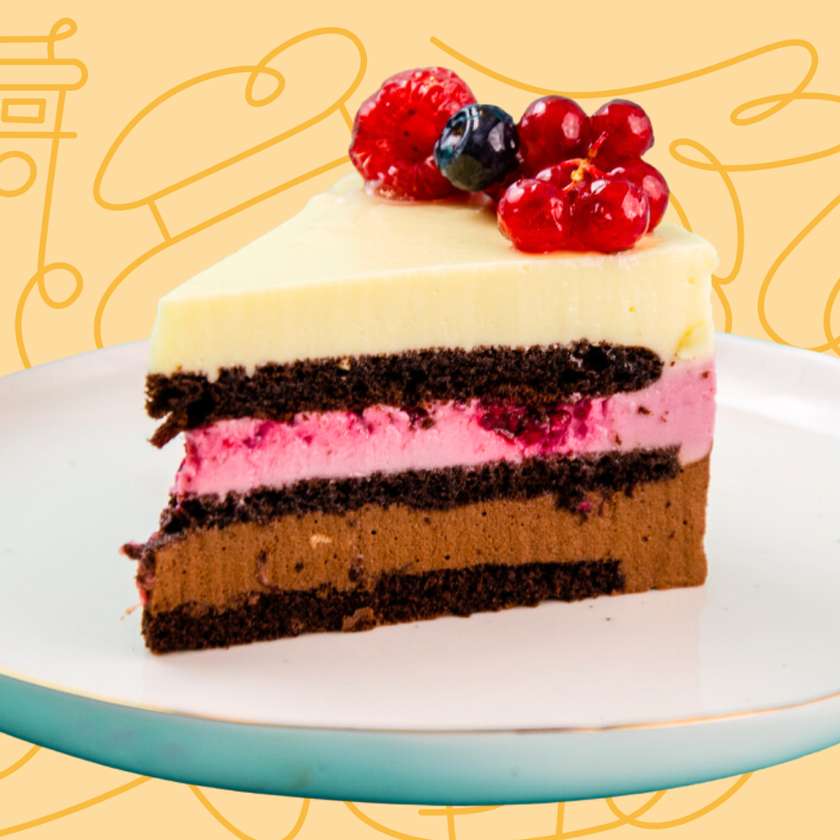 Slice of mousse cake with berries