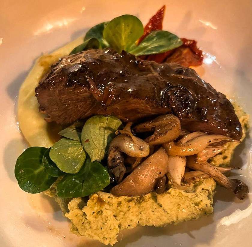 Braised cheek with hummus and potato cream